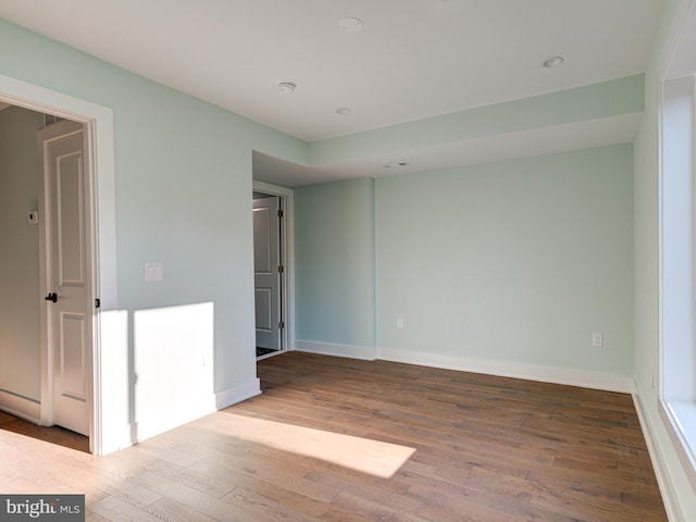 unfurnished room featuring light hardwood / wood-style floors