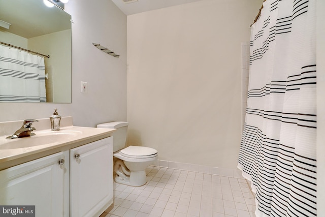 bathroom featuring tile patterned flooring, vanity, toilet, and a shower with shower curtain