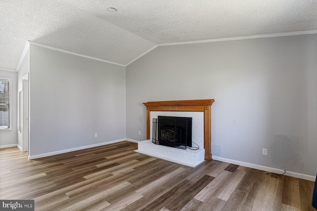 1762 Red Oak Ln, Waldorf, MD 20601 - unfurnished living room featuring ornamental molding, baseboards, wood finished floors, and lofted ceiling