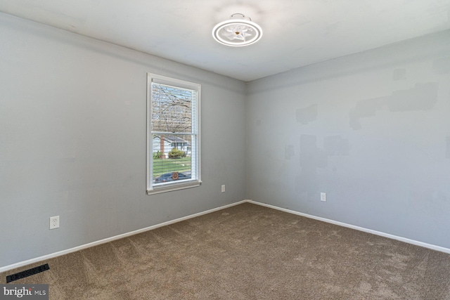 1762 Red Oak Ln, Waldorf, MD 20601 - empty room featuring dark carpet, baseboards, and visible vents