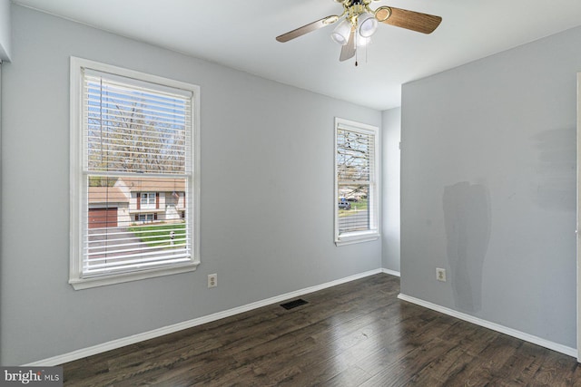 1762 Red Oak Ln, Waldorf, MD 20601 - unfurnished room featuring visible vents, baseboards, a ceiling fan, and dark wood-style floors