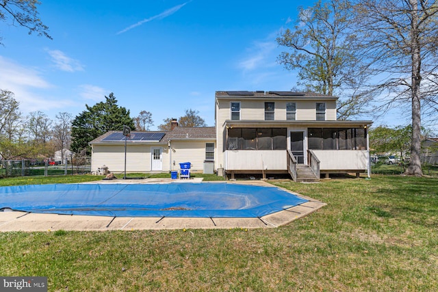 1762 Red Oak Ln, Waldorf, MD 20601 - view of pool with a sunroom, a fenced in pool, fence, and a lawn