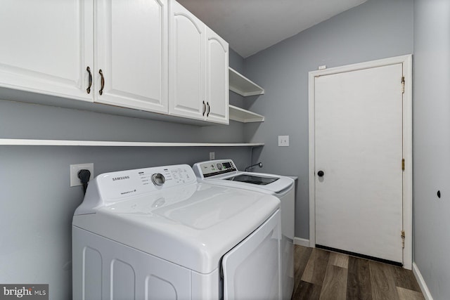 1762 Red Oak Ln, Waldorf, MD 20601 - laundry room with dark wood-type flooring, separate washer and dryer, baseboards, and cabinet space