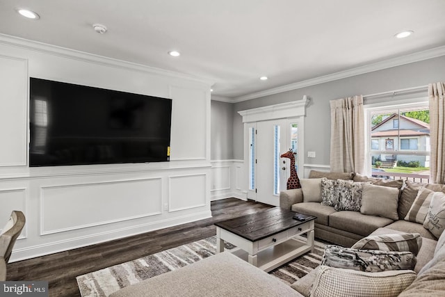 living room featuring ornamental molding and dark hardwood / wood-style floors