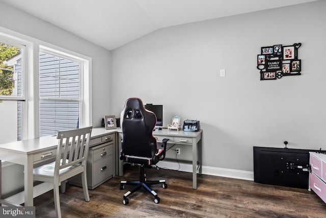 office with lofted ceiling and dark hardwood / wood-style floors