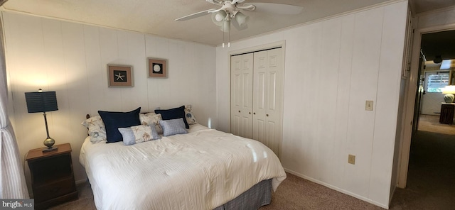 bedroom featuring carpet floors, ceiling fan, and a closet