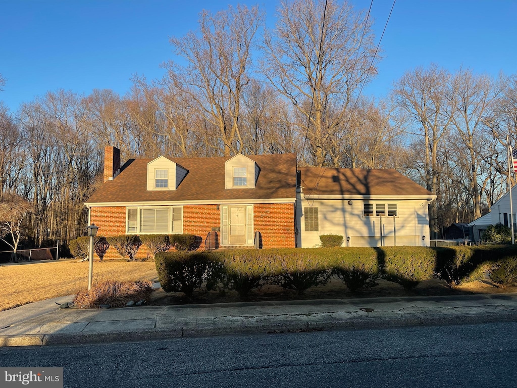 view of new england style home