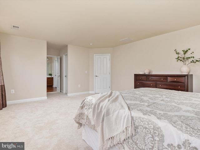 bedroom with light carpet