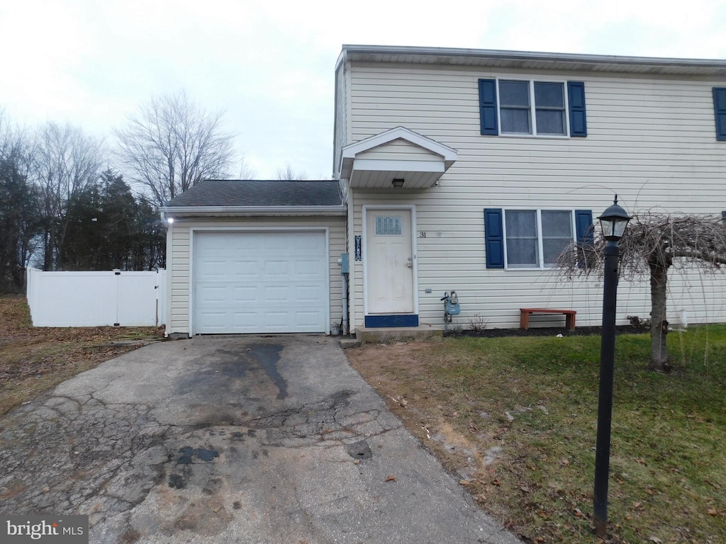 view of property featuring a garage