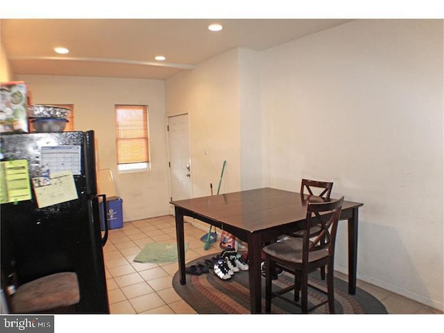 dining space with light tile patterned flooring