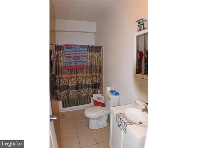 full bathroom with shower / bath combination with curtain, vanity, toilet, and tile patterned flooring