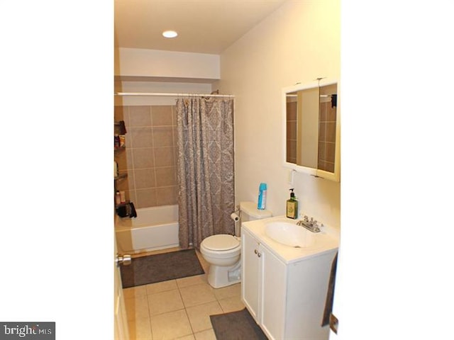 full bathroom with tile patterned flooring, vanity, shower / bathtub combination with curtain, and toilet