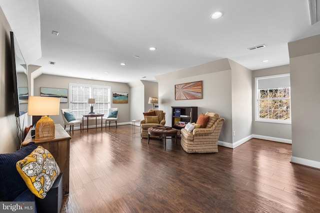 sitting room featuring baseboards, visible vents, wood finished floors, and recessed lighting