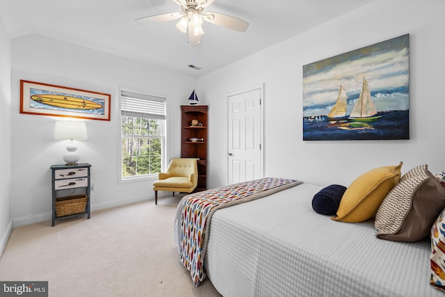 bedroom with ceiling fan, carpet, visible vents, and baseboards