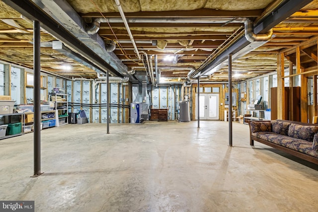 unfinished basement with gas water heater