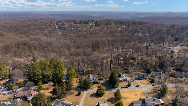 bird's eye view featuring a view of trees