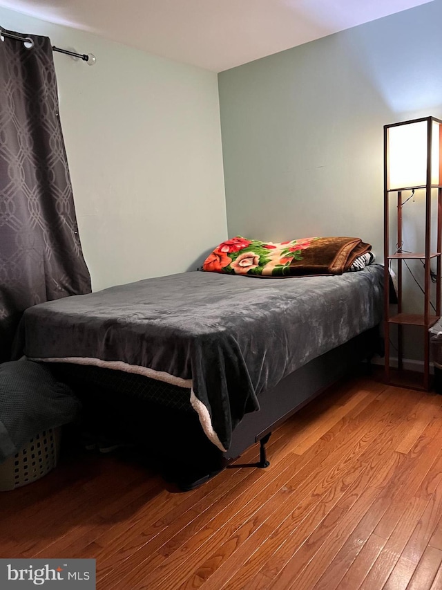 bedroom featuring light wood-type flooring