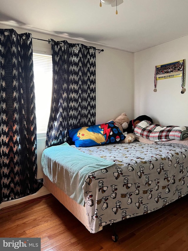 bedroom featuring wood-type flooring