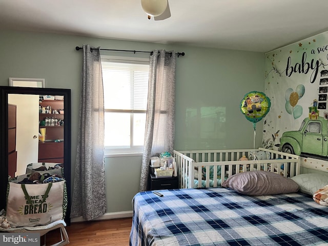 bedroom featuring hardwood / wood-style flooring