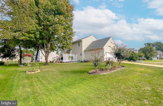 view of yard with a garage