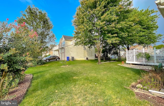 view of yard featuring fence