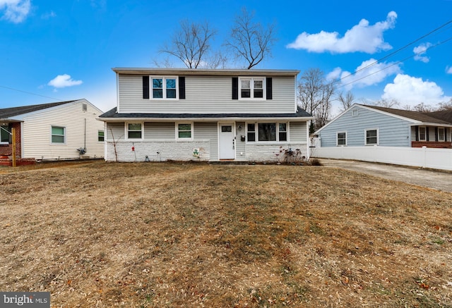 front of property with a front yard