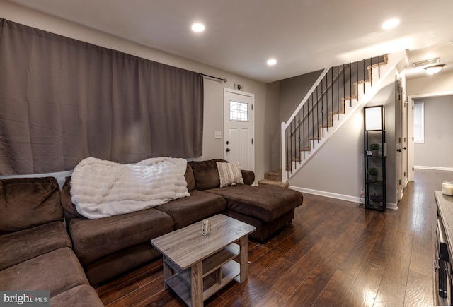 living room with dark hardwood / wood-style floors