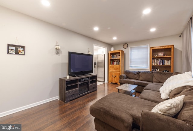 living room with dark hardwood / wood-style floors