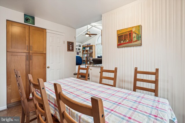 dining area with lofted ceiling and ceiling fan