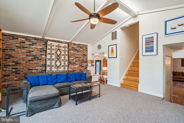 living room with carpet, beam ceiling, visible vents, stairway, and baseboards