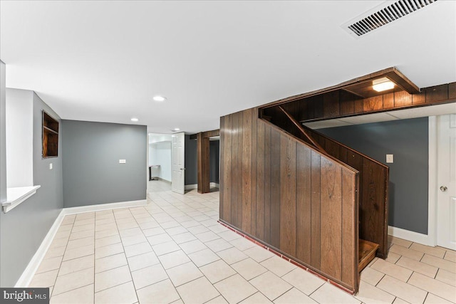 interior space with light tile patterned floors