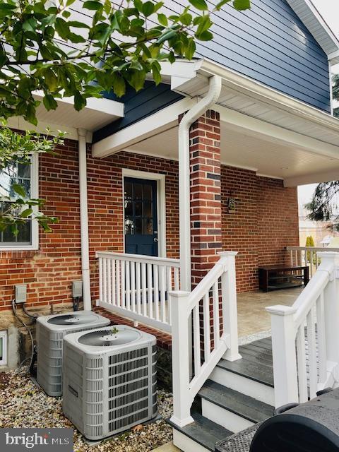 property entrance with cooling unit