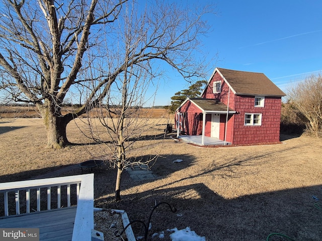 exterior space with a storage shed