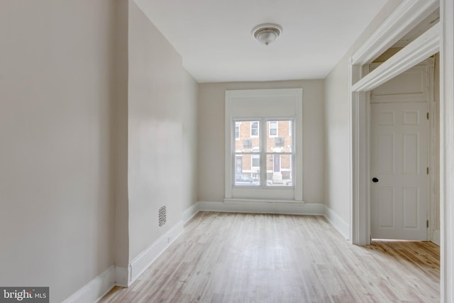 empty room featuring light hardwood / wood-style flooring