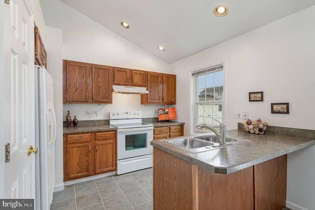 kitchen with lofted ceiling, sink, white appliances, light tile patterned floors, and kitchen peninsula