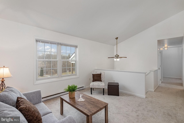 living room featuring vaulted ceiling, a baseboard heating unit, and light colored carpet