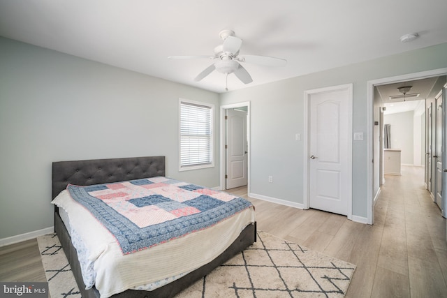 bedroom featuring ceiling fan and light hardwood / wood-style floors