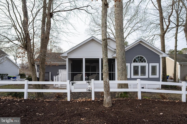 view of front of property with a sunroom