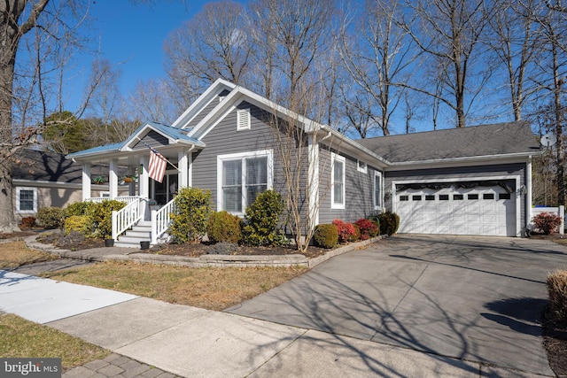 view of front facade featuring a garage and a porch