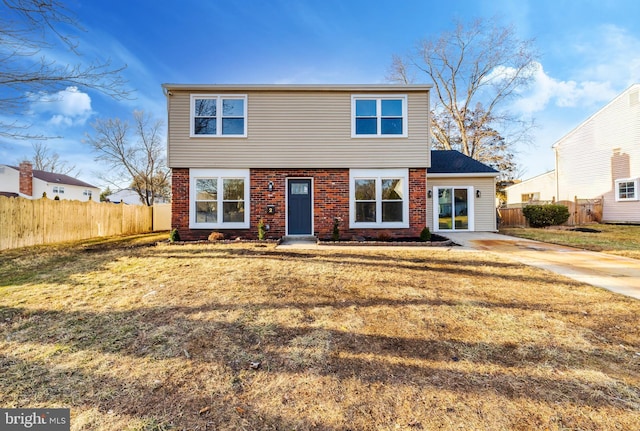 view of front of home with a front lawn