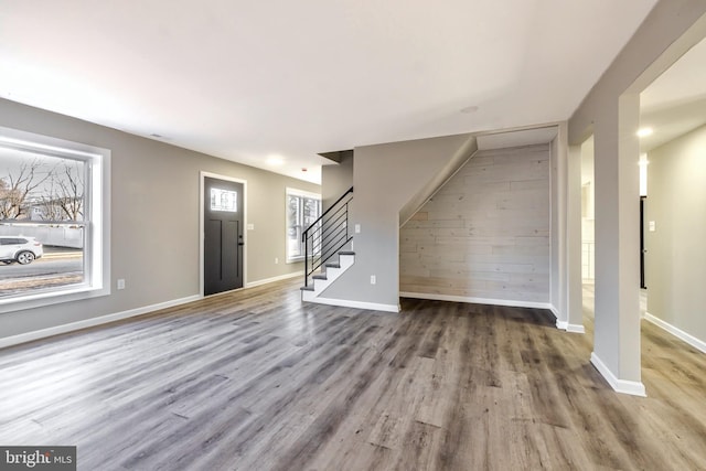 entryway featuring hardwood / wood-style flooring and a healthy amount of sunlight