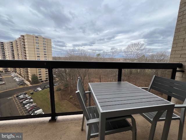 balcony featuring outdoor dining area