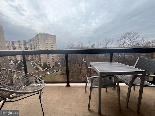 balcony featuring a city view