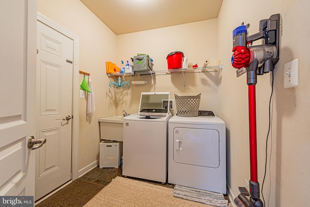 washroom featuring washing machine and dryer