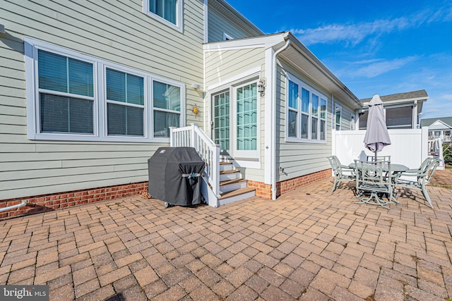 view of patio with a grill