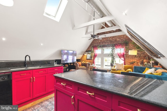 kitchen featuring lofted ceiling with skylight, brick wall, dishwasher, sink, and ceiling fan