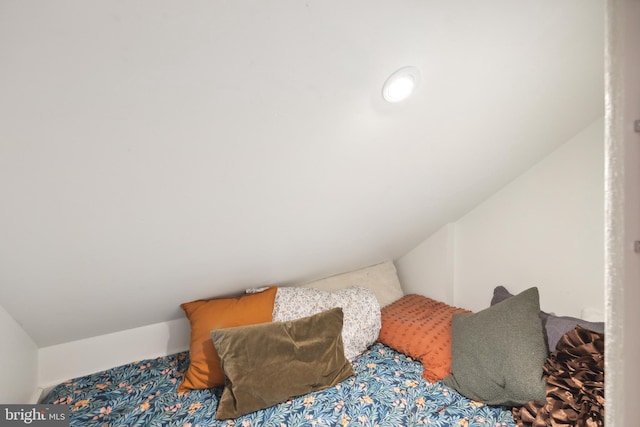 bedroom with vaulted ceiling