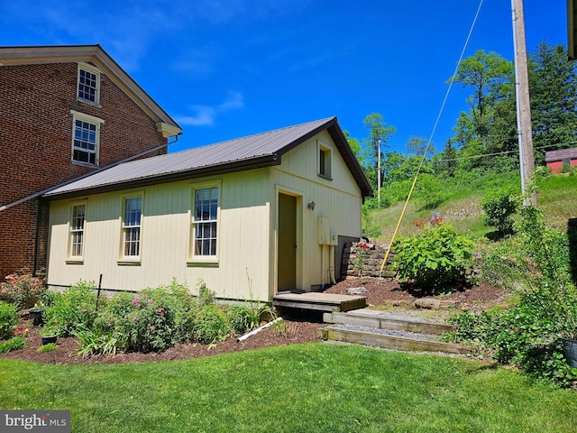 exterior space with a lawn