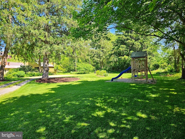 view of yard with a playground