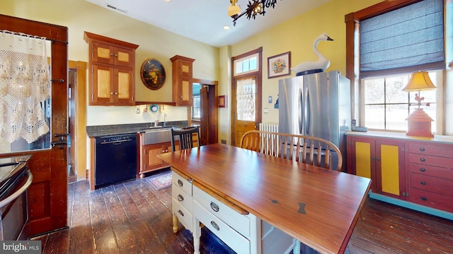 dining room with dark hardwood / wood-style flooring